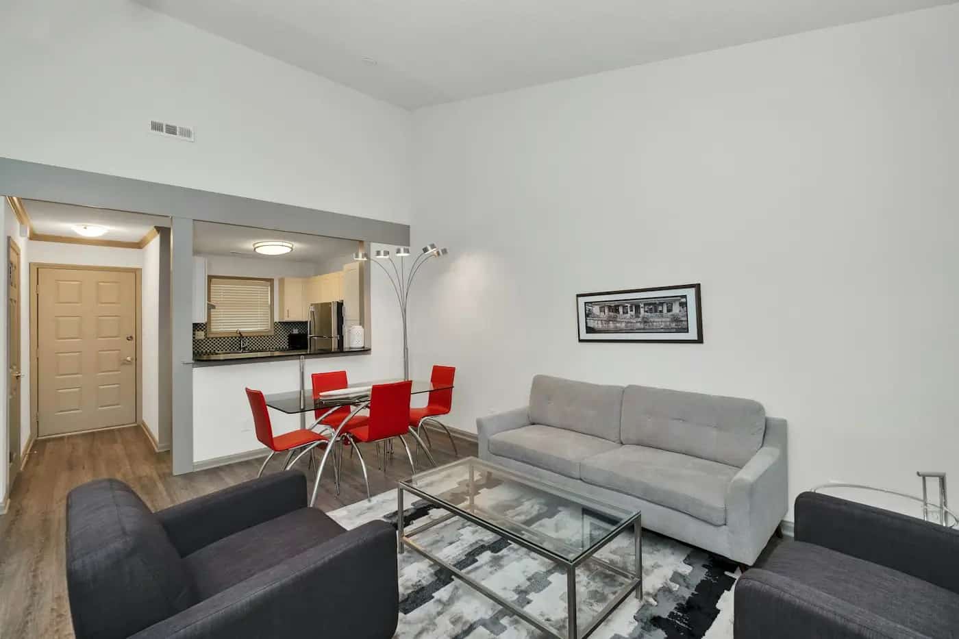 Grey sofa by a white wall
